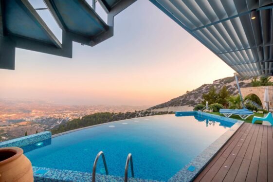 blue lounger beside swimming pool